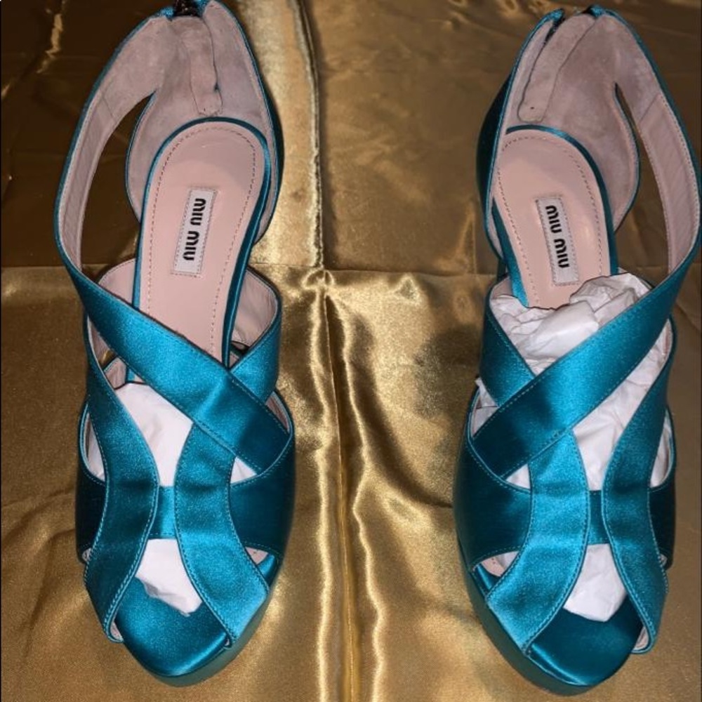 Teal miu miu 5 inches peep toe heel.